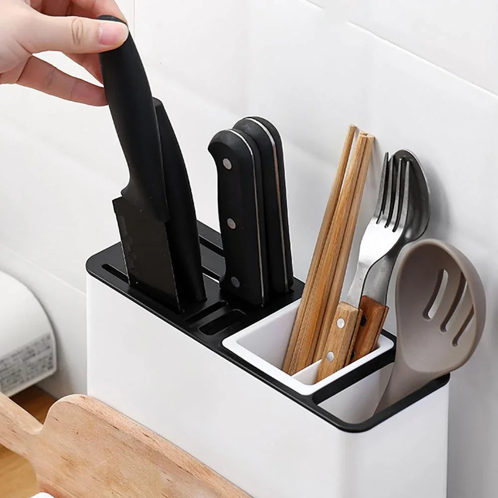 Modern kitchen knife block with utensil holder, storing knives, chopsticks, and spoons for organized countertop storage.