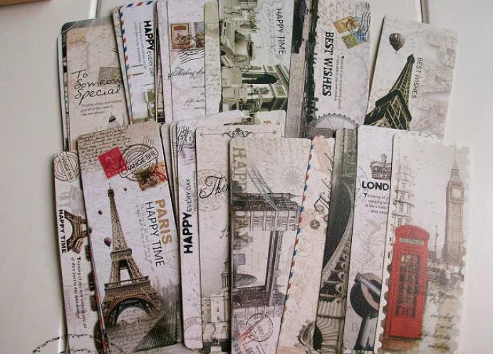 Vintage travel-themed bookmarks featuring Eiffel Tower, London phone booth, and global landmarks for readers