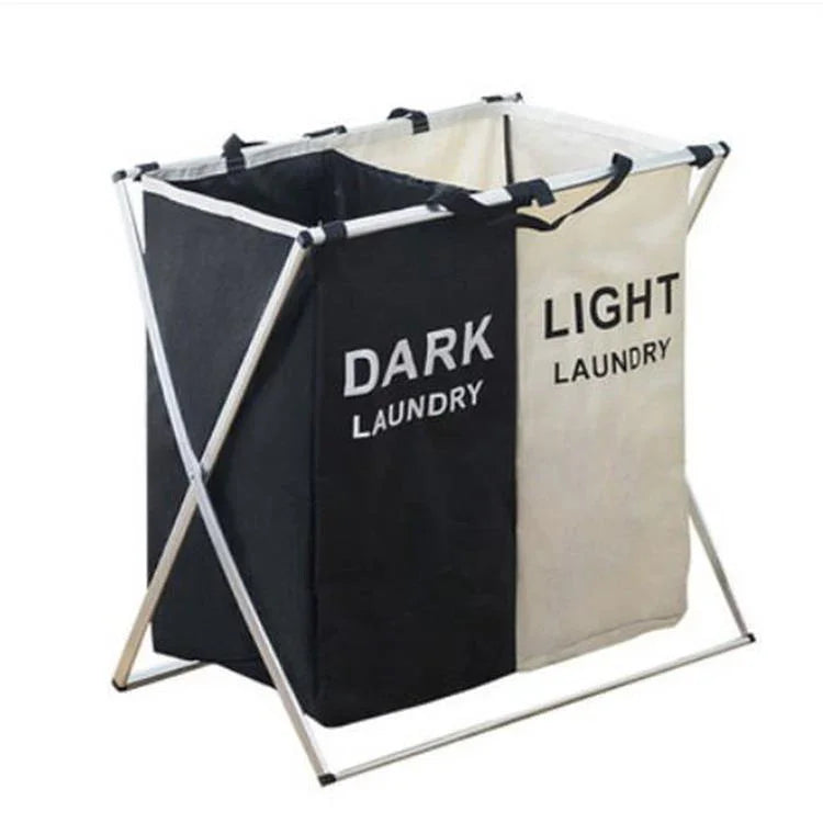 Black and beige dual-compartment laundry sorter for dark and light clothes, collapsible metal frame