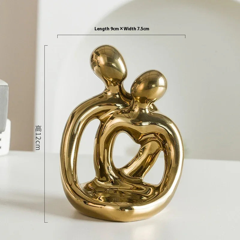 Golden couple sculpture with heart shape, 12cm tall, modern home decor for living room or office