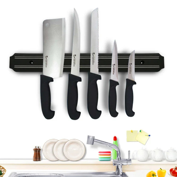 Magnetic knife holder with 5 kitchen knives, black mount, stainless steel blades, ideal for modern kitchen organization