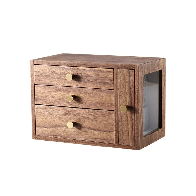 Wooden storage box with three drawers, side door and brass handles on white background