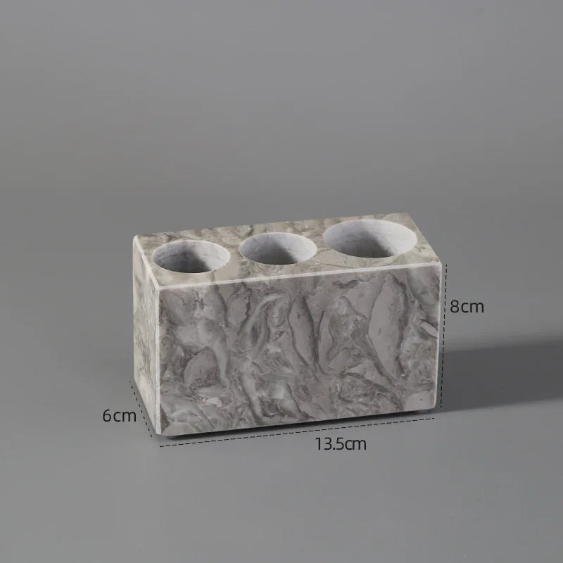 Rectangular marble pen holder with three round slots, 13.5x6x8cm, on gray background