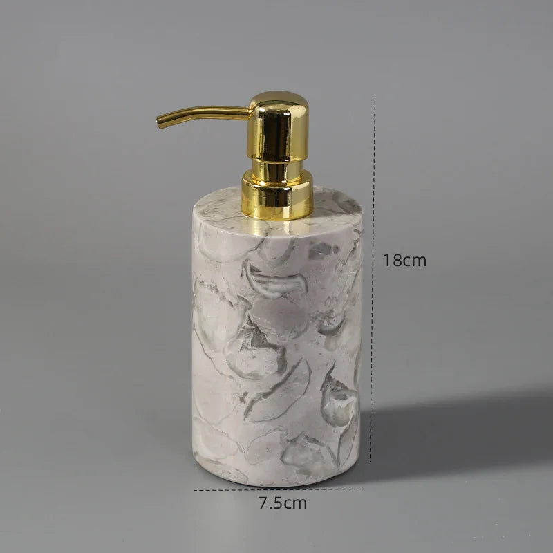 Marble texture soap dispenser with gold pump, 18cm tall, 7.5cm wide on gray background