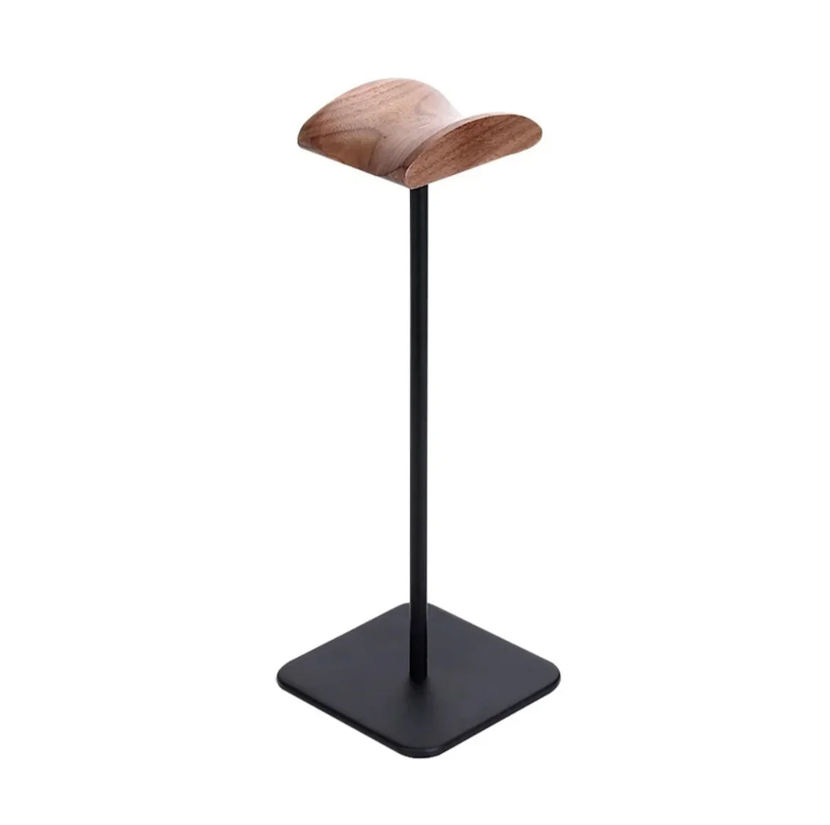 Minimalist wooden and metal headphone stand with square black base on white background